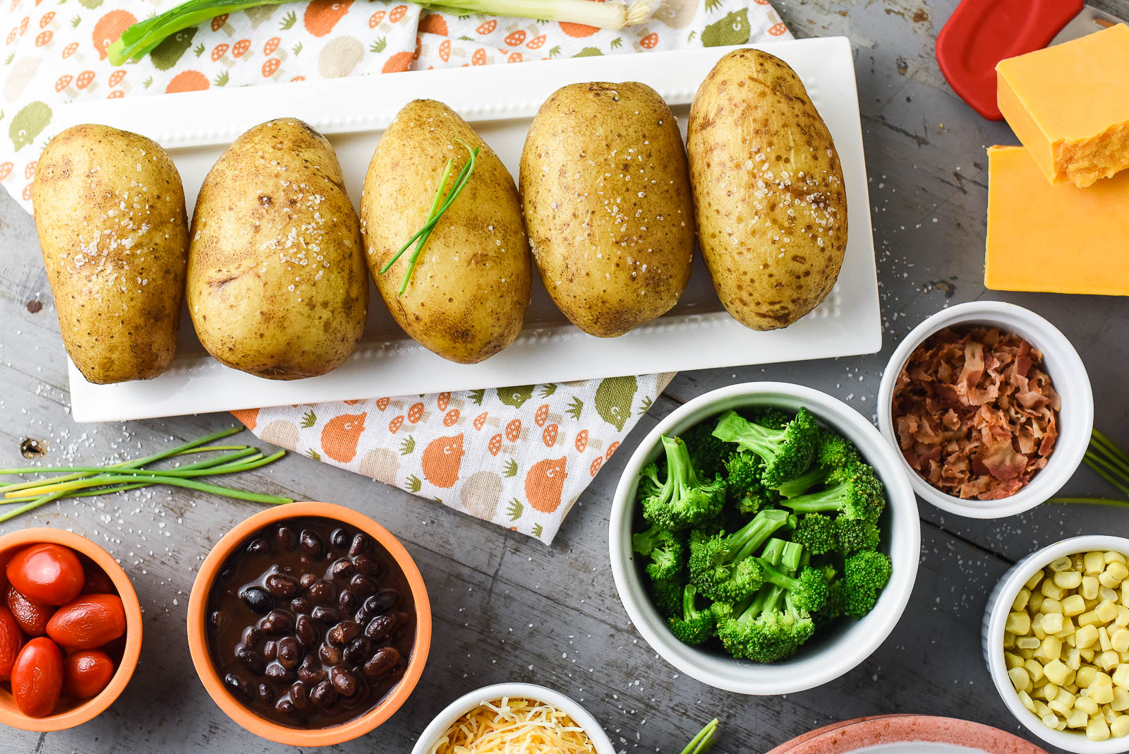 A Kid-Friendly Baked Potato Bar with Slow Cooker Baked Potatoes