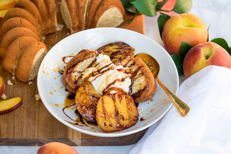 Grilled Mascarpone Pound Cake with Grilled Peaches, Vanilla Bean Whipped Cream and Caramel Sauce