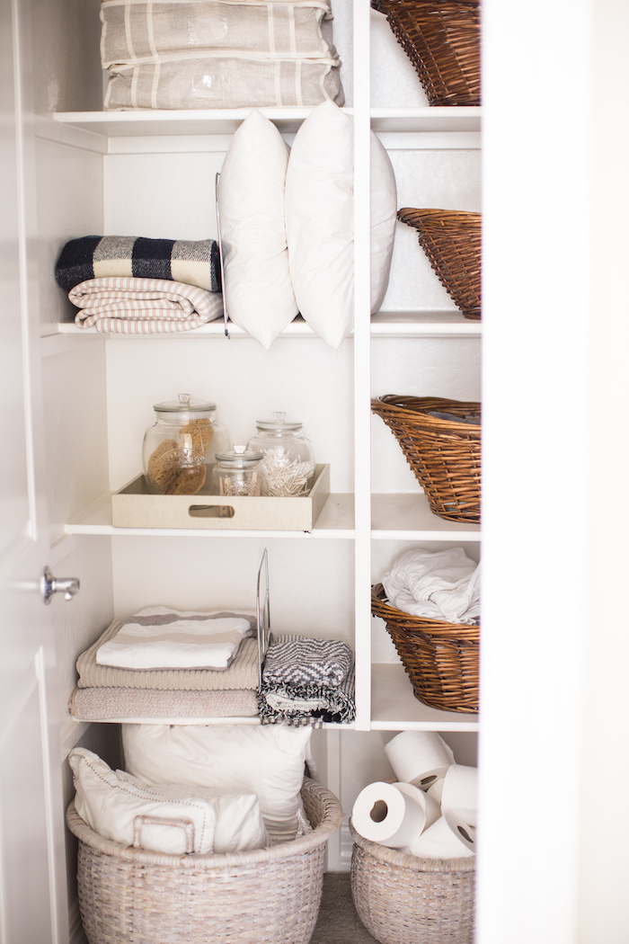 Bathroom Linen Closet Organization - The Simply Organized Home