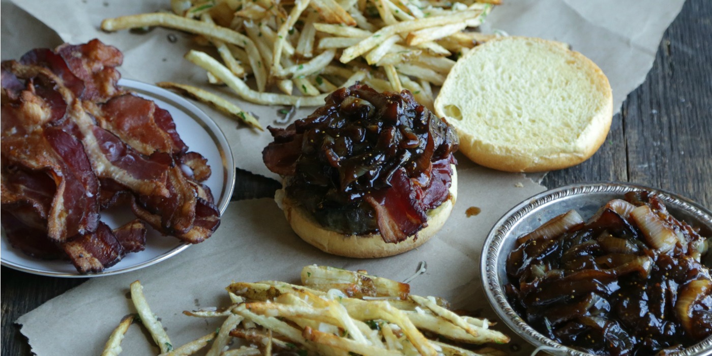 Fig-Onion Burger with Crispy Bacon, Brie + Blue Cheese with Garlic Butter Truffle Fries