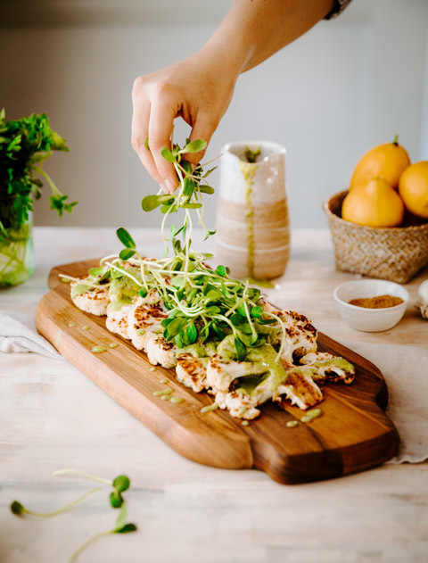 Roasted Cauliflower Steaks with Green Tahini Sauce