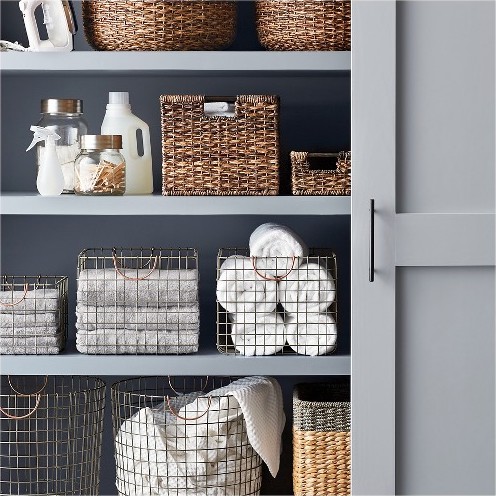 9 Ways to Organize Your Linen Closet That’ll Make You Feel Like Marie Kondo