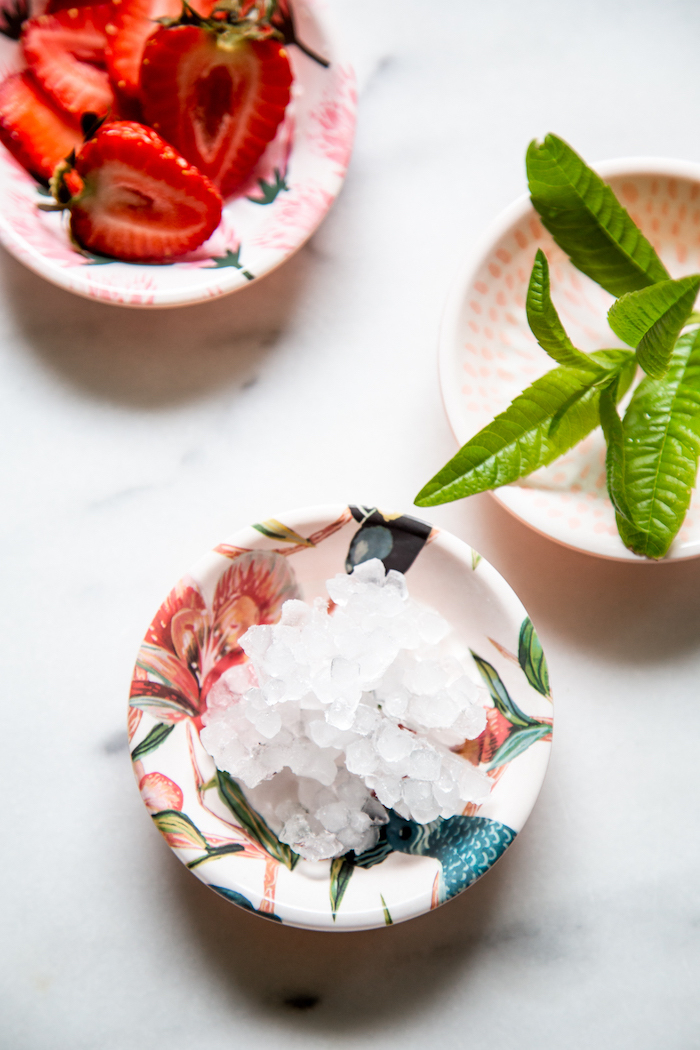 Strawberry snow cone- crushed ice, a splash of lemon juice, and