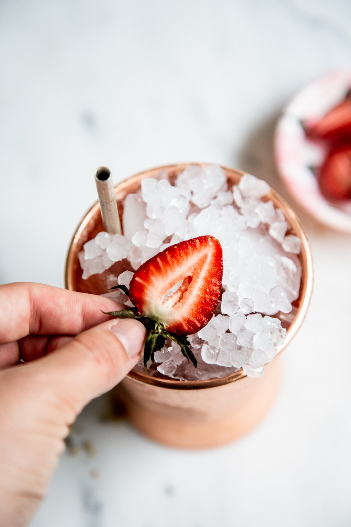 Strawberry snow cone- crushed ice, a splash of lemon juice, and